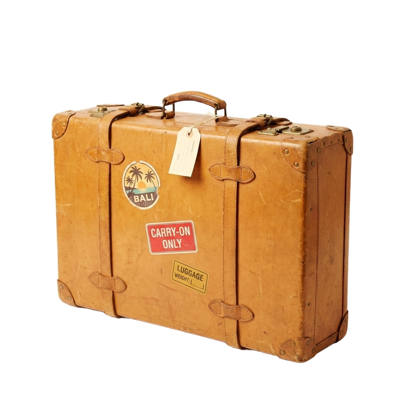 Packed vintage suitcase covered in travel stickers